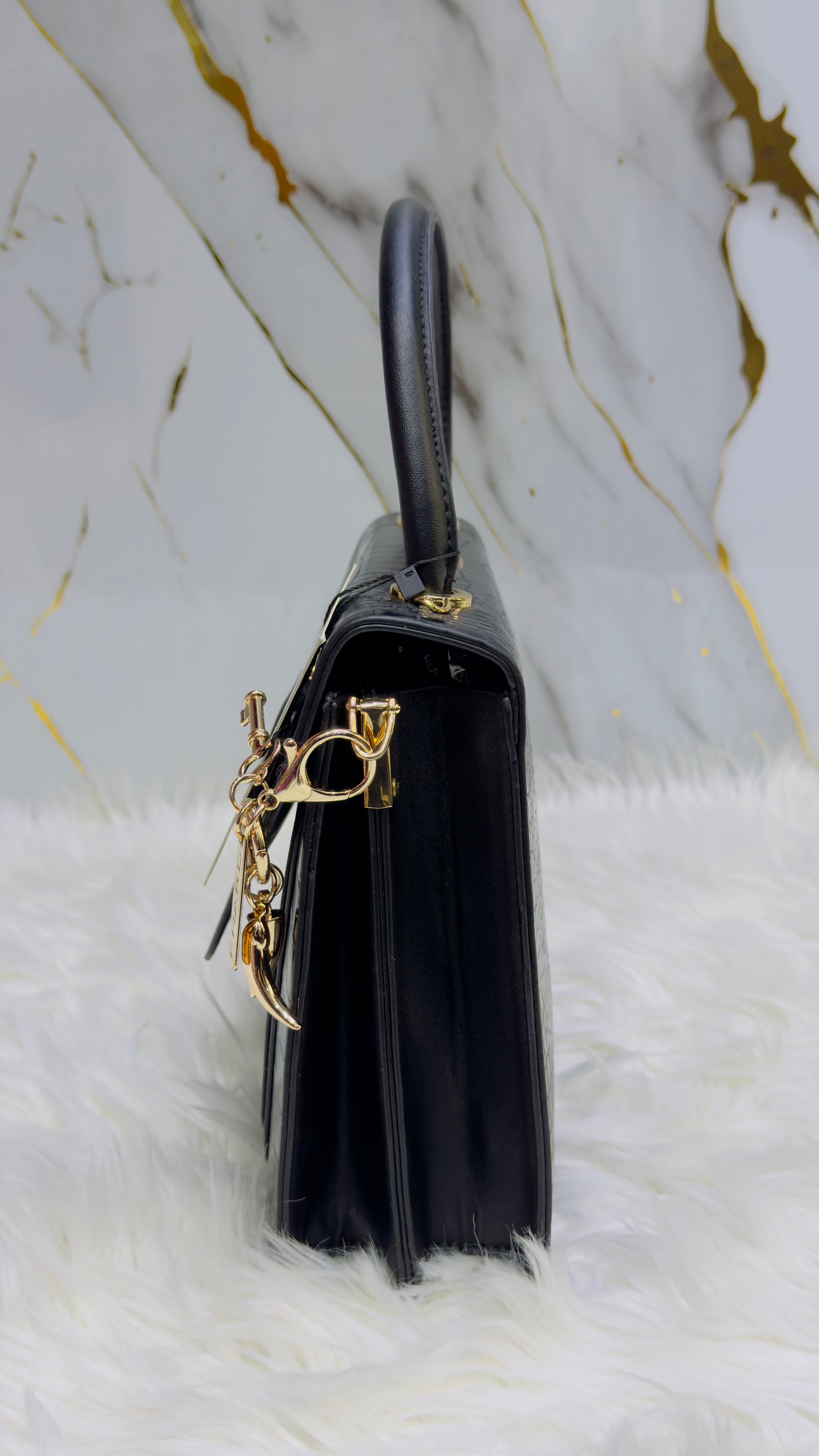 Borsa Phard con ciondolo in ecopelle misura media