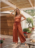 Coordinato Pdk top con applicazioni e pantalone a palazzo morbido