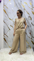 Coordinato pdk pantalone a palazzo e blusa tinta unita